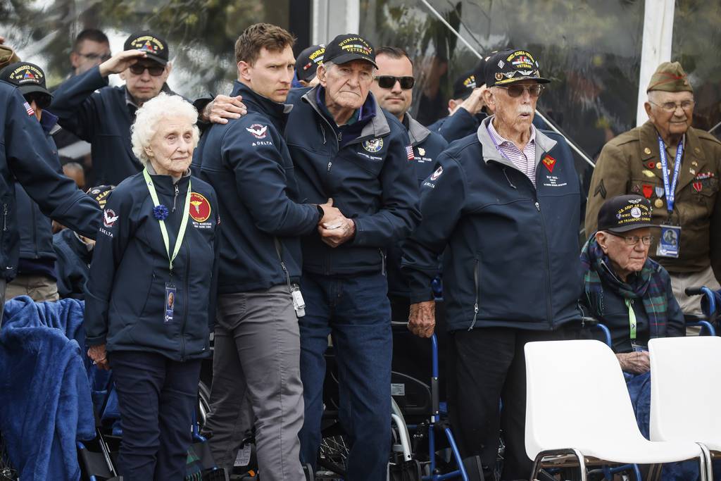 U.S. war veterans attend a ceremony to mark the 79th anniversary of the assault that led to the liberation of France and Western Europe from Nazi control, at the American Cemetery in Colleville-sur-Mer, Normandy, France, Tuesday, June 6, 2023.
