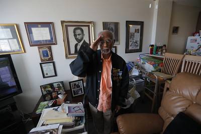 World War II veteran Johnnie Jones Sr. poses for a portrait at his home in Baton Rouge, La.