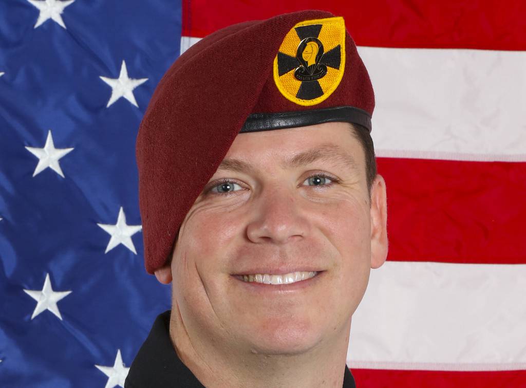 This photo provided by the U.S. Army Parachute Team shows Sgt. 1st Class Michael Ty Kettenhofen.