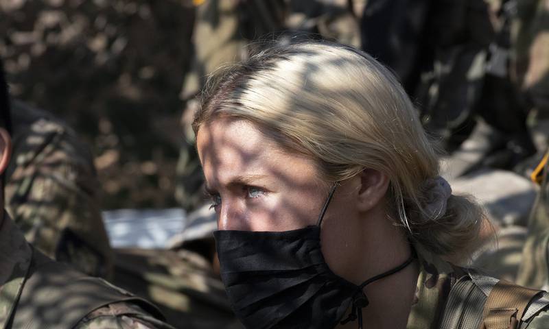 Madison Warne, of Valhalla, N.Y, listens to instructions at a mortar range, Friday, Aug. 7, 2020, at the U.S. Military Academy in West Point, N.Y.