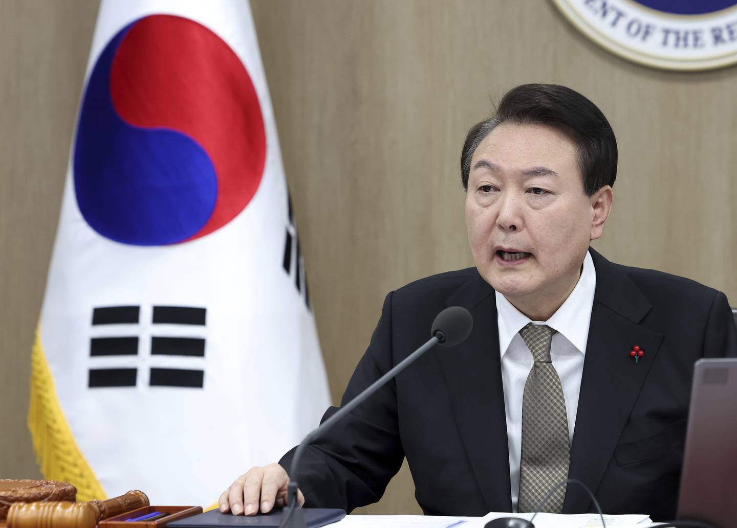South Korean President Yoon Suk Yeol speaks during a cabinet council meeting at the presidential office in Seoul, South Korea, Tuesday, Dec. 27, 2022.