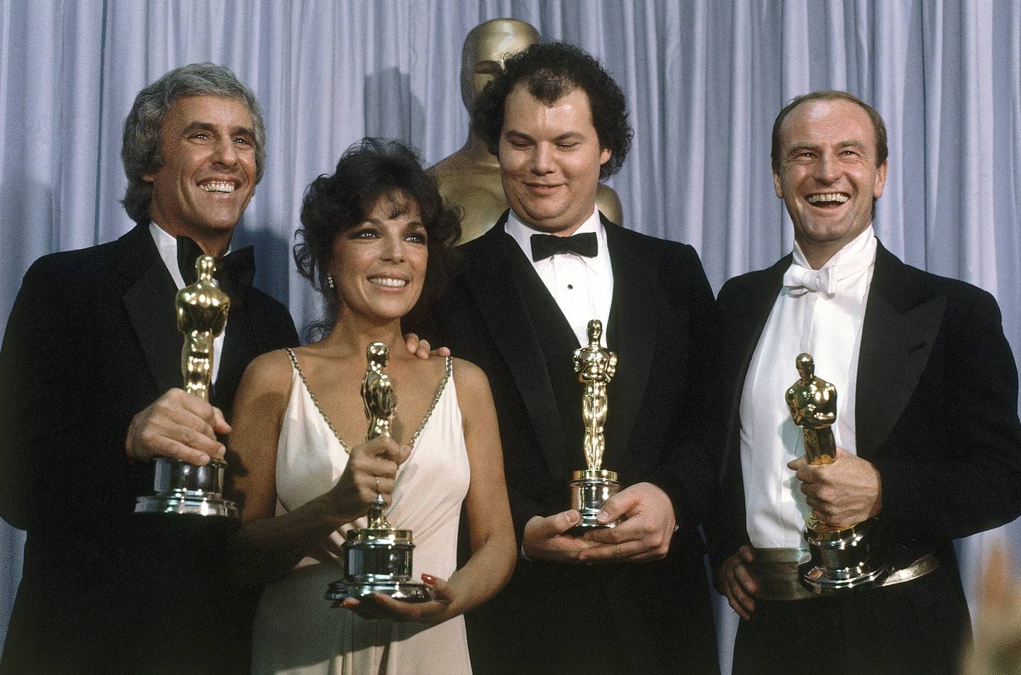 Burt Bacharach, from left, appears with Carole Bayer Sager, Christopher Cross and Peter Allen, winners of the Oscar for best original song "Arthur's Theme (Best That You Can Do)" at the 54th Annual Academy Awards in Los Angeles on March 29, 1982.