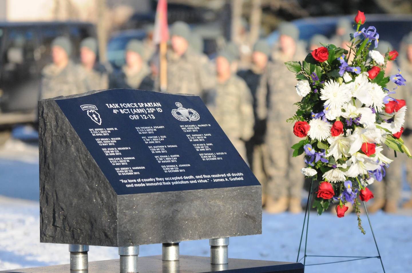 The memorial monument at Joint Base Elmendorf-Richardson, Alaska, honoring the paratroopers of the Spartan Brigade is unveiled on Nov. 16, 2012.
