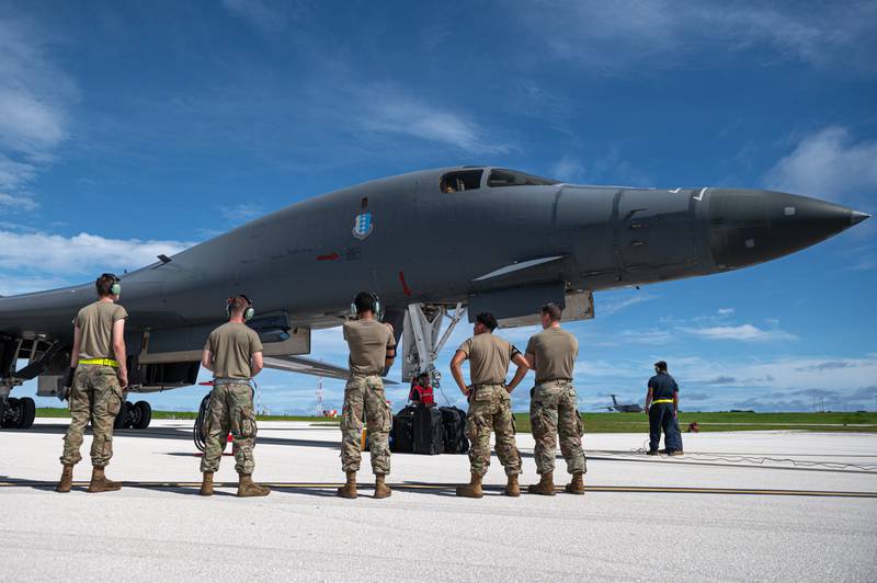 Airmen assigned to the 28th Bomb Wing receive a US Air Force B-1B Lancer assigned to the 37th Expeditionary Bomb Squadron, Ellsworth Air Force Base, South Dakota, after landing at Andersen Air Force Base, Guam, in support of the Bomber Task Force.  , Oct.  18, 2022. Bomber missions contribute to allied civilian and non-violent countermeasures in the Indo-Pacific by demonstrating the US Air Force's ability to operate anywhere in the world at any time in support of the National Defense Strategy.  (Senior Airman Yosselin Campos/Air Force)