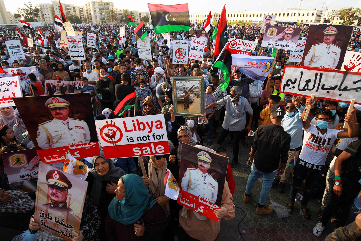 Supporters of Libyan military strongman Khalifa Haftar take part in a gathering in the eastern Libyan port city of Benghazi on July 5, 2020, to protest against Turkish intervention in the country's affairs.