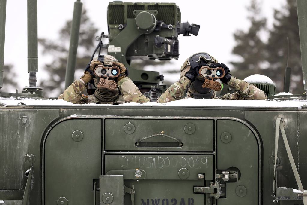 Soldiers from 1st Squadron, 2d Cavalry Regiment, enhanced Forward Presence Battle Group Poland, keep watch on targets  during a joint combat live fire of the Gepard Air Defense System Feb. 2, 2021, at Bemowo Piskie Training Area, Poland.