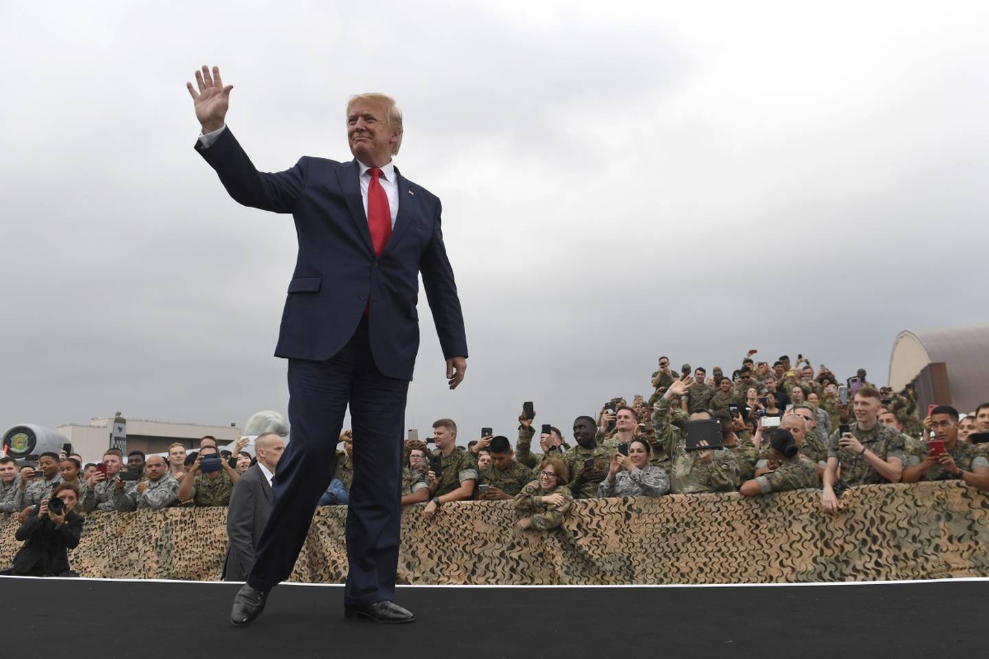 President Donald Trump arrives to speak to troops at Osan Air Base in South Korea, Sunday, June 30, 2019.