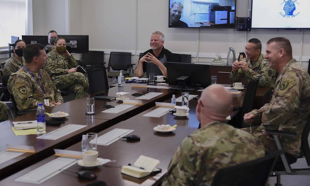 Ambassador Andrew Young, deputy to the commander for civil-military engagement, U.S. Africa Command, talks with senior leaders during a battlefield circulation, Sep. 18, 2020, at the CJTF-HOA headquarters building, Camp Lemonnier, Djibouti.