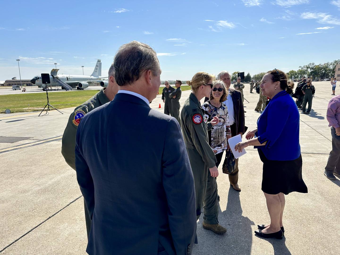U.S. Sen. Deb Fischer (right) speaks to Col. Kristen Thompson (left), commander of the 55th Wing, as Rep. Don Bacon, R-Neb., looks on, at Offutt Air Force Base on Sept. 30, 2022.