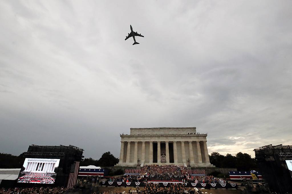 Special Air Mission 28000, Air Force One when the president is aboard, flies over Washington during an Independence Day celebration attended by President Donald Trump at the Lincoln Memorial on July 4, 2019, in Washington