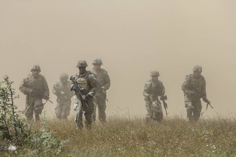 Cavalry scouts maneuver toward cover after an air assault during Platinum Lion 19 at Novo Selo Training Area in Bulgaria on July 9, 2019.