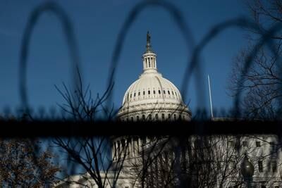 Razor wire is seen topping a security fence Jan. 14, 2021, in preparation for next week's presidential inauguration in Washington.