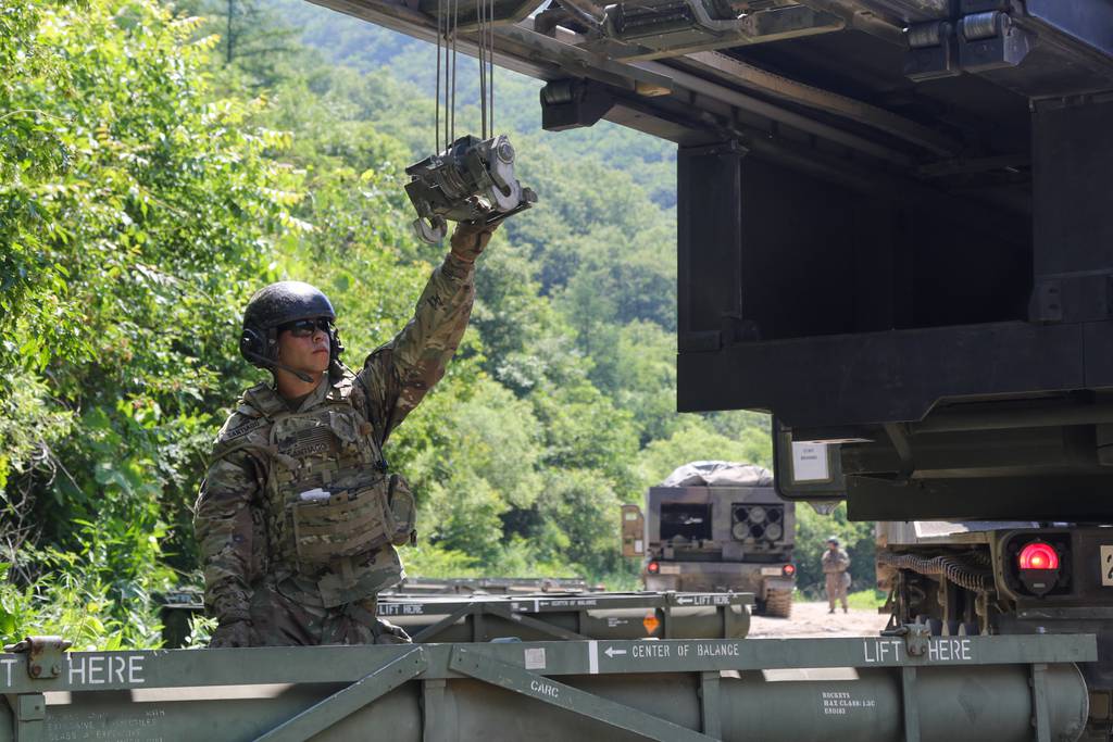 A soldier loads his M270 Multiple Launch Rocket System vehicle during a live-fire training event, June 25, 2019, Republic of Korea.