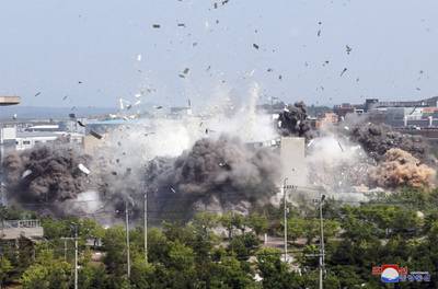 This photo provided by the North Korean government shows the explosion of an inter-Korean liaison office building in Kaesong, North Korea, Tuesday, June 16, 2020.
