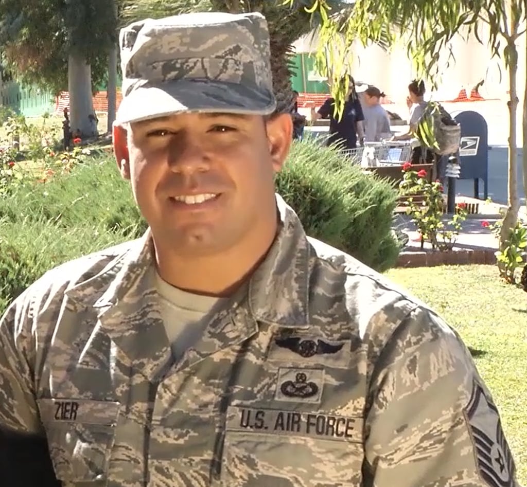 Then-Master Sgt. Jeremy Zier sends holiday greetings to San Antonio, Texas from Incirlik Air Base, Turkey, in 2013. Zier has been demoted from senior master sergeant to technical sergeant and will retire after being convicted of abusive sexual contact and dereliction of duty. (Screenshot of Air Force video)