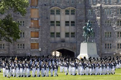 In this May 22, 2019, file photo, members of the senior class march past a statue of George Washington during Parade Day at the U.S. Military Academy in West Point, N.Y.