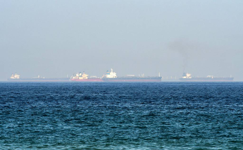 This picture taken on June 15, 2019, shows tanker ships in the waters of the Gulf of Oman off the coast of the eastern UAE emirate of Fujairah.
