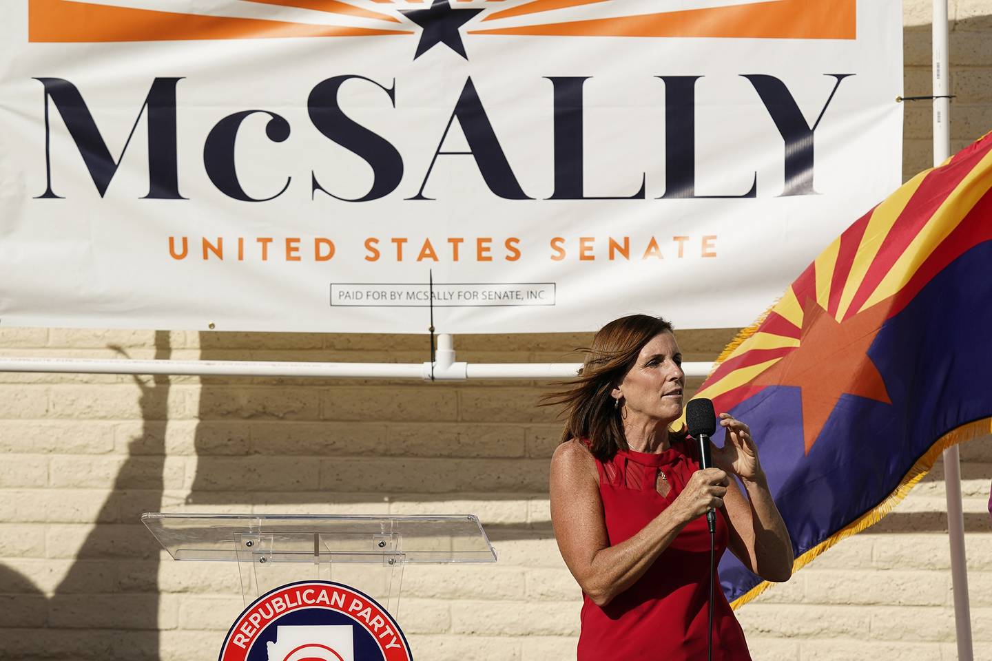 Arizona Republican Sen. Martha McSally campaigns at Republican Party Headquarters Monday, Nov. 2, 2020, in Phoenix.