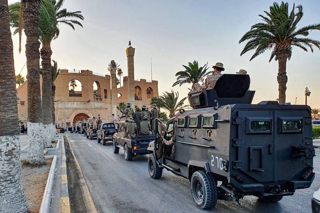 Vehicles of the "Tripoli Brigade," a militia loyal to the UN-recognized Government of National Accord (GNA), parade through the Martyrs' Square at the center of the GNA-held Libyan capital Tripoli on July 10, 2020