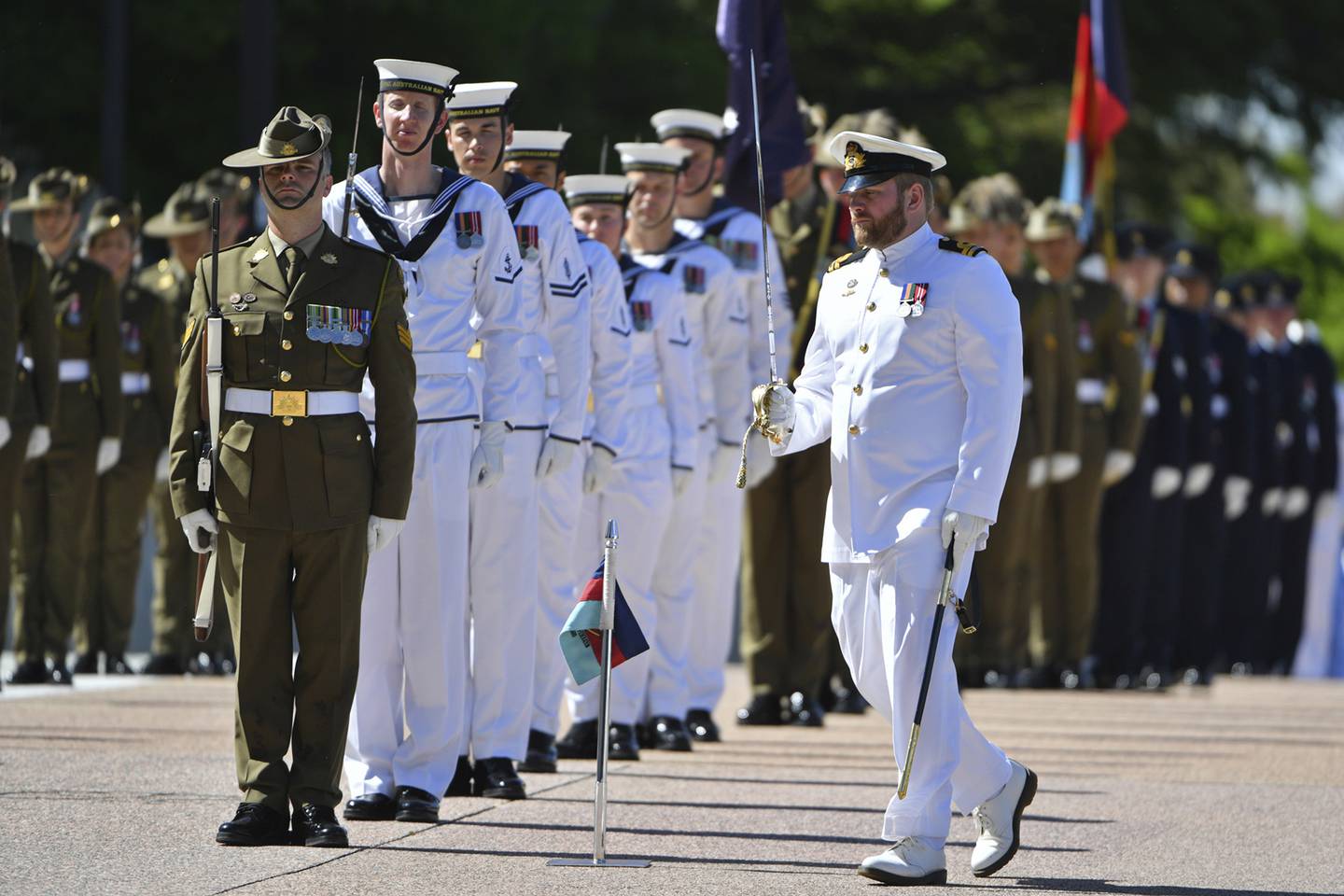 An honor guard is formed at Defence Headquarters in Canberra, Australia, Thursday, Nov. 19, 2020, before findings from the Inspector-General of the Australian Defence Force Afghanistan Inquiry are released.
