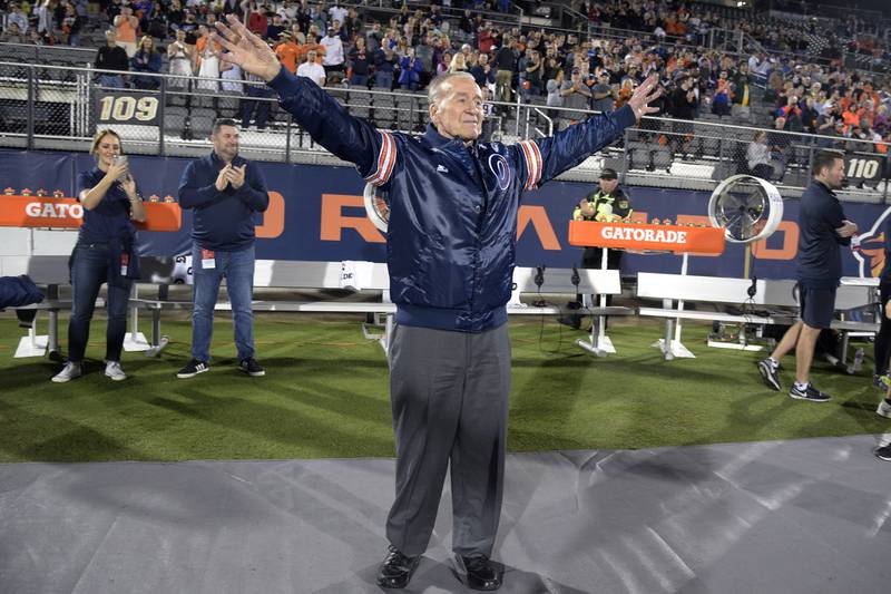 Apollo 7 astronaut Walter Cunningham acknowledges the crowd before an Alliance of American Football game between the Orlando Apollos and the Atlanta Legend, Feb. 9, 2019, in Orlando, Fla.