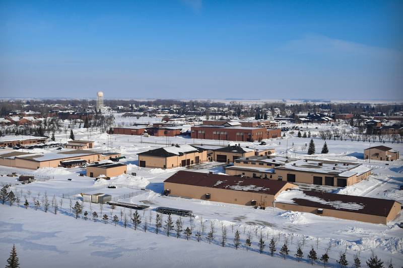 A cloudless day allows the sun to melt snow from several rooftops Jan. 22, 2020, on Grand Forks Air Force Base, N.D.