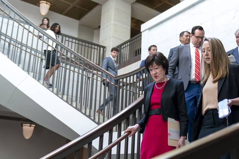 Sen. Susan Collins, R-Maine, left, arrives for a closed-door briefing about the leaked highly classified military documents, on Capitol Hill, Wednesday, April 19, 2023, in Washington.