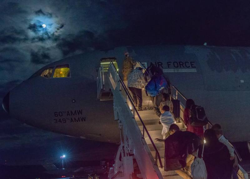Just after midnight on Aug. 23, 2021, the first group of evacuees from Afghanistan who stayed at Ramstein Air Base, Germany, left for the United States on a military transport jet. (Air Force photo via Facebook)