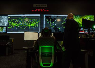Personnel pose for photos in the cyber operations center at Lasswell Hall aboard Fort Meade, Maryland, Feb. 5, 2020.