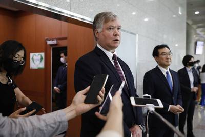 U.S. Deputy Secretary of State Stephen Biegun, center, speaks to the media beside his South Korean counterpart Lee Do-hoon after their meeting at the Foreign Ministry in Seoul on July 8, 2020.