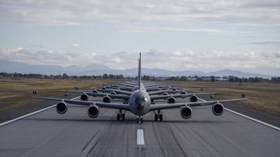 A row of 20 KC-135 Stratotankers line up on the flight line at Fairchild Air Force Base, Washington, Sept. 29, 2021. (Airman 1st Class Anneliese Kaiser/Air Force)