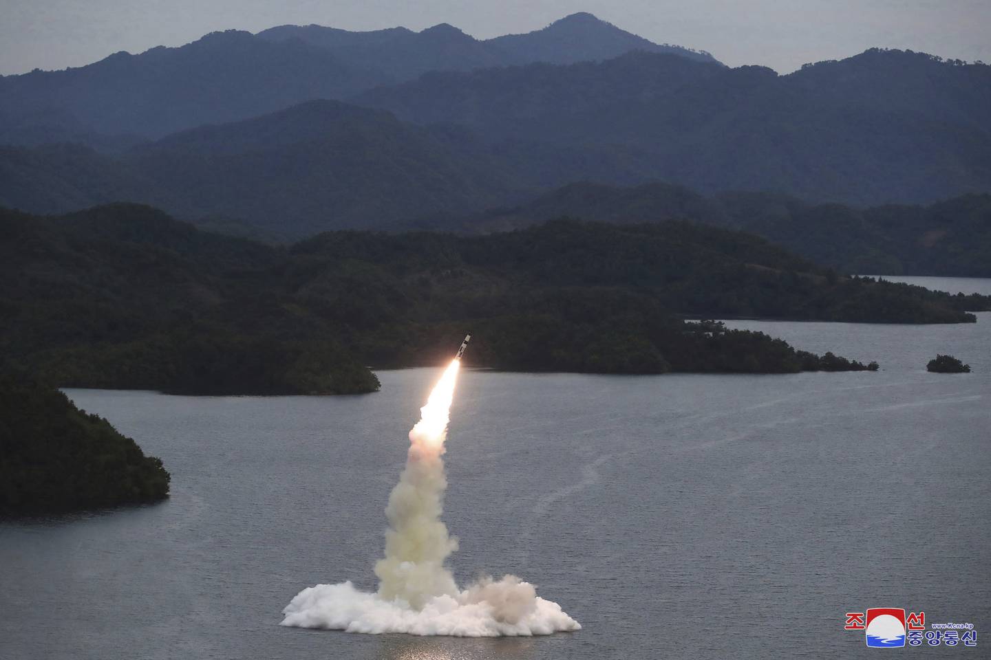 This photo provided on Oct. 10, 2022, by the North Korean government purports to show a missile test at an undisclosed location in North Korea, as taken sometime between Sept. 25 and Oct. 9.