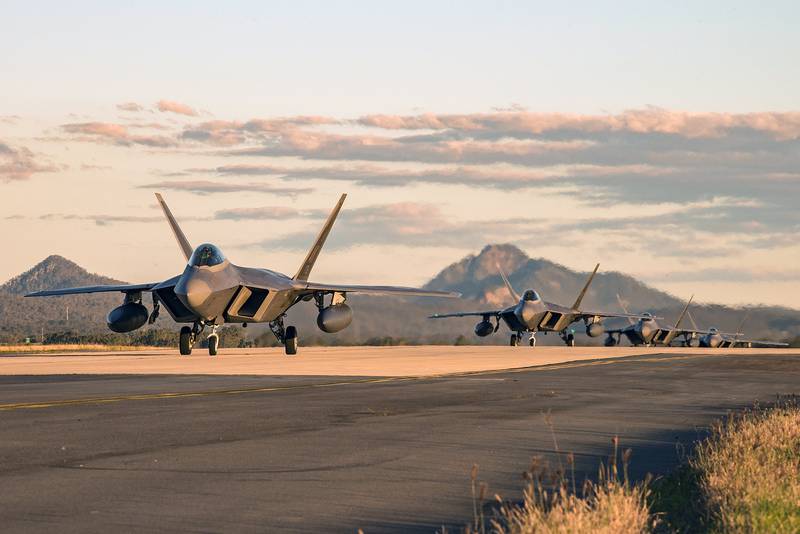 F-22 Raptors assigned taxi to their parking location at the Royal Australian Air Force Base Amberley flightline for Talisman Sabre 19 on July 9.