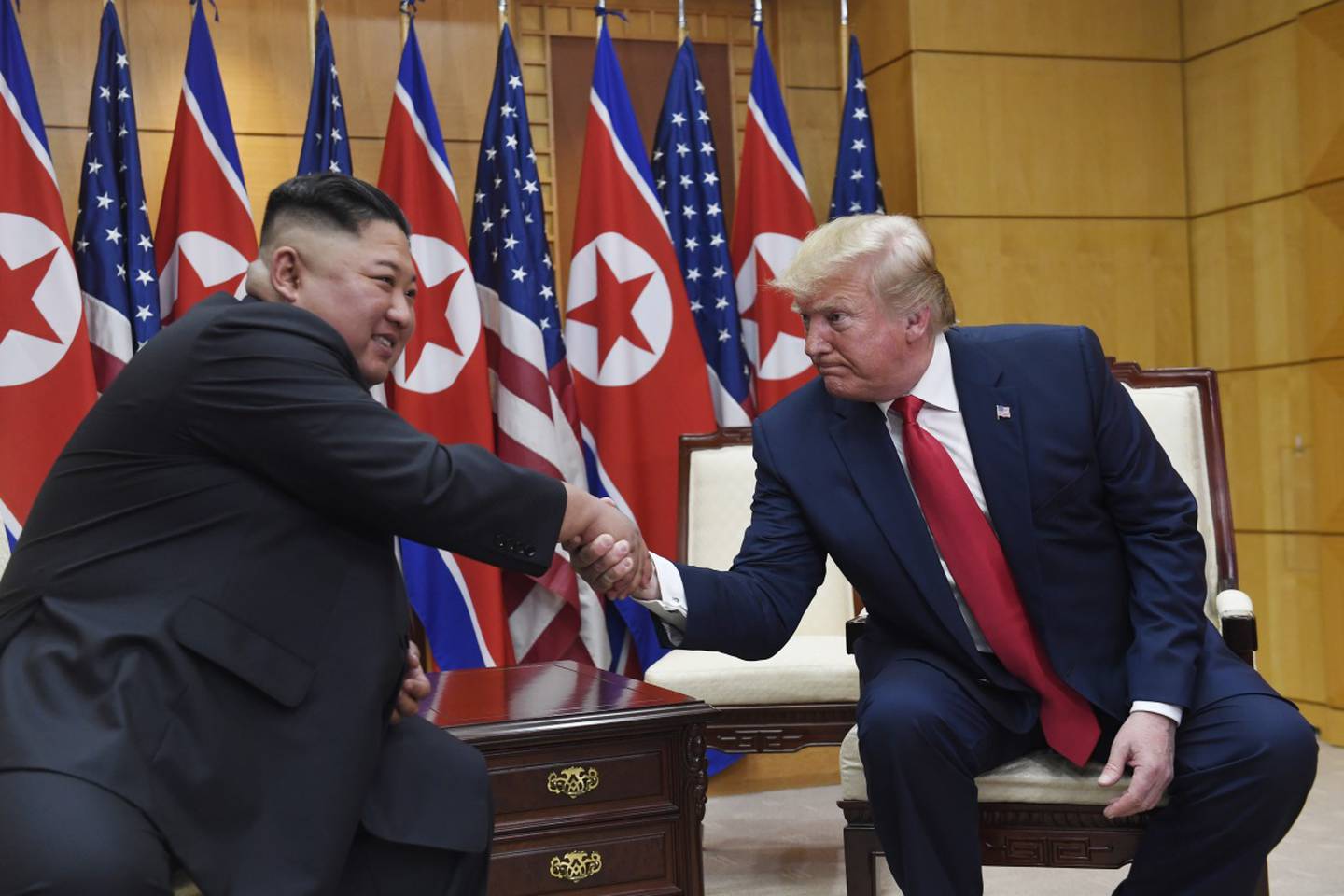 President Donald Trump meets with North Korean leader Kim Jong Un at the border village of Panmunjom in the Demilitarized Zone, South Korea, Sunday, June 30, 2019.