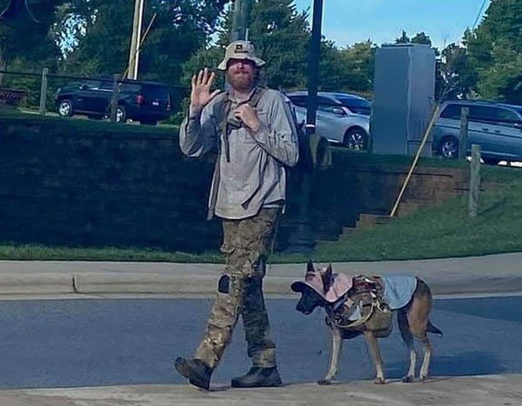 She was just doing her job': Homeless vet loses service dog during arrest  for panhandling