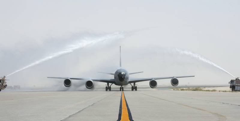 Fire engines with the U.S. Air Force 379th Expeditionary Civil Engineer Squadron Fire Department give U.S. Air Force Brig. Gen. Darren James, the commander of the 379th Air Expeditionary Wing, a water salute after completing his fini-flight at Al Udeid Air Base, Qatar, May 29, 2017.