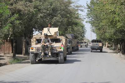 Afghan security forces arrive during a fight against Taliban fighters in Kunduz province north of Kabul, Afghanistan, Saturday, Aug. 31, 2019.