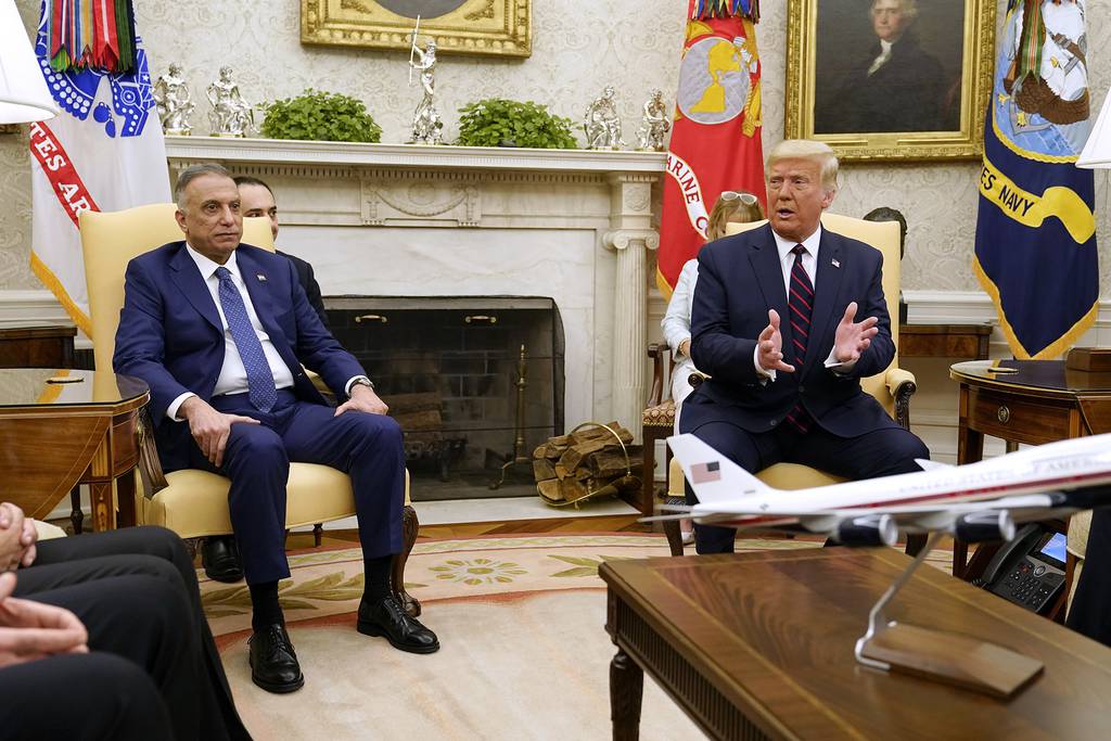President Donald Trump meets with Iraqi Prime Minister Mustafa al-Kadhimi in the Oval Office of the White House, Thursday, Aug. 20, 2020, in Washington.