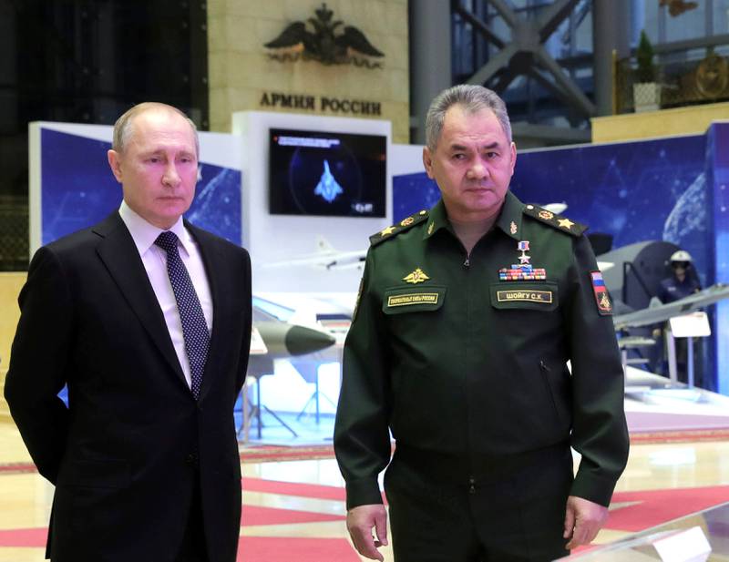 Russian President Vladimir Putin, Defense Minister Sergei Shoigu