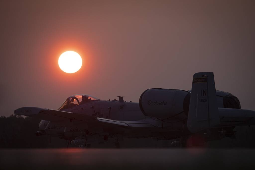 An Air Force A-10C Thunderbolt II sits on the flightline at sunrise during Northern Strike 19 at the Alpena Combat Readiness Training Center, Mich., July 26, 2019.