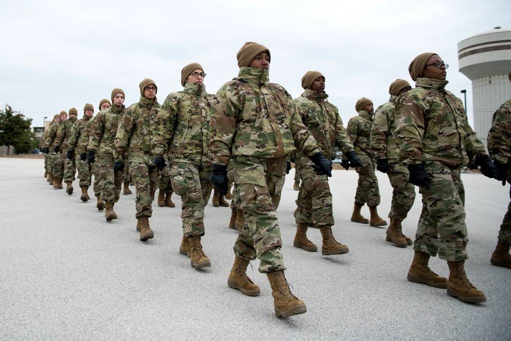 U.S. Air Force basic military training trainees practice marching, Nov. 13, 2019, at Joint Base San Antonio-Lackland, Texas. (Sarayuth Pinthong/Air Force)