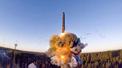 In this file photo taken from a video distributed by Russian Defense Ministry Press Service, on Dec. 9, 2020, a ground-based intercontinental ballistic missile was launched from the Plesetsk facility in northwestern Russia as part of military drills.