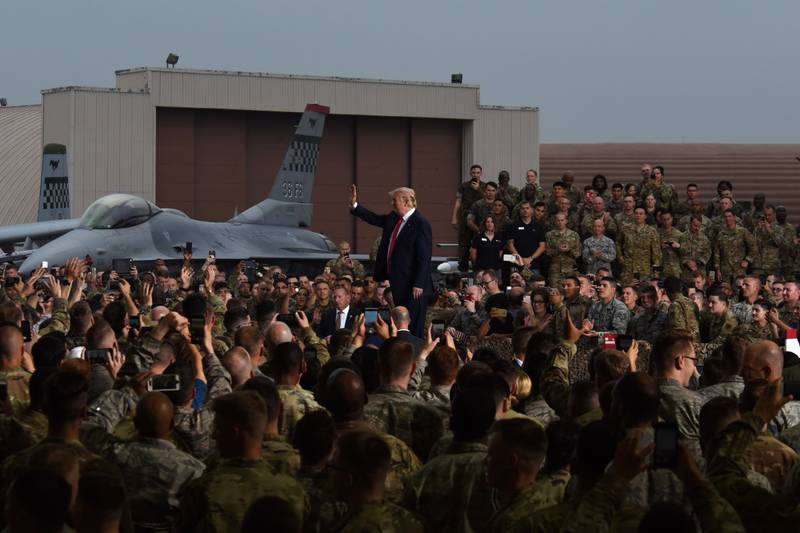 President Donald Trump addresses service members and their families during an event at Osan Air Base, South Korea, June 30, 2019.