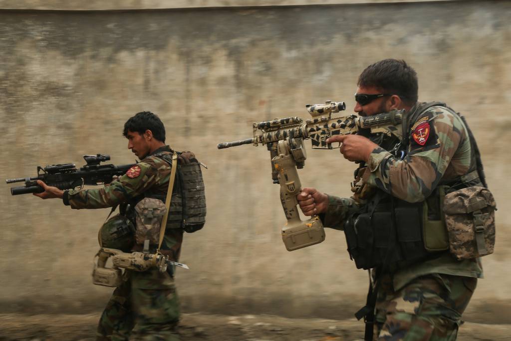 Commandos assigned to 1st Special Operations Kandak clear a training compound during  breaching training in Laghman province, Afghanistan, Feb. 13, 2018.