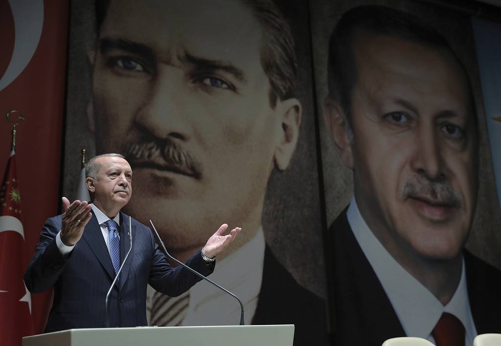 Turkey's President Recep Tayyip Erdogan addresses his ruling party members in Ankara on July 26, 2019.