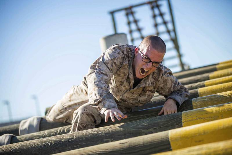 Taryn Bunton, a recruit with Lima Company, 3rd Recruit Training Battalion, participates in the confidence course at Marine Corps Recruit Depot, San Diego, Nov. 16, 2020.