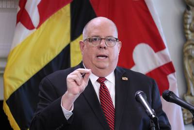 Maryland Gov. Larry Hogan announces he will lift an order that closed non-essential businesses this week during a news conference on Wednesday, June 3, 2020 in Annapolis, Md.