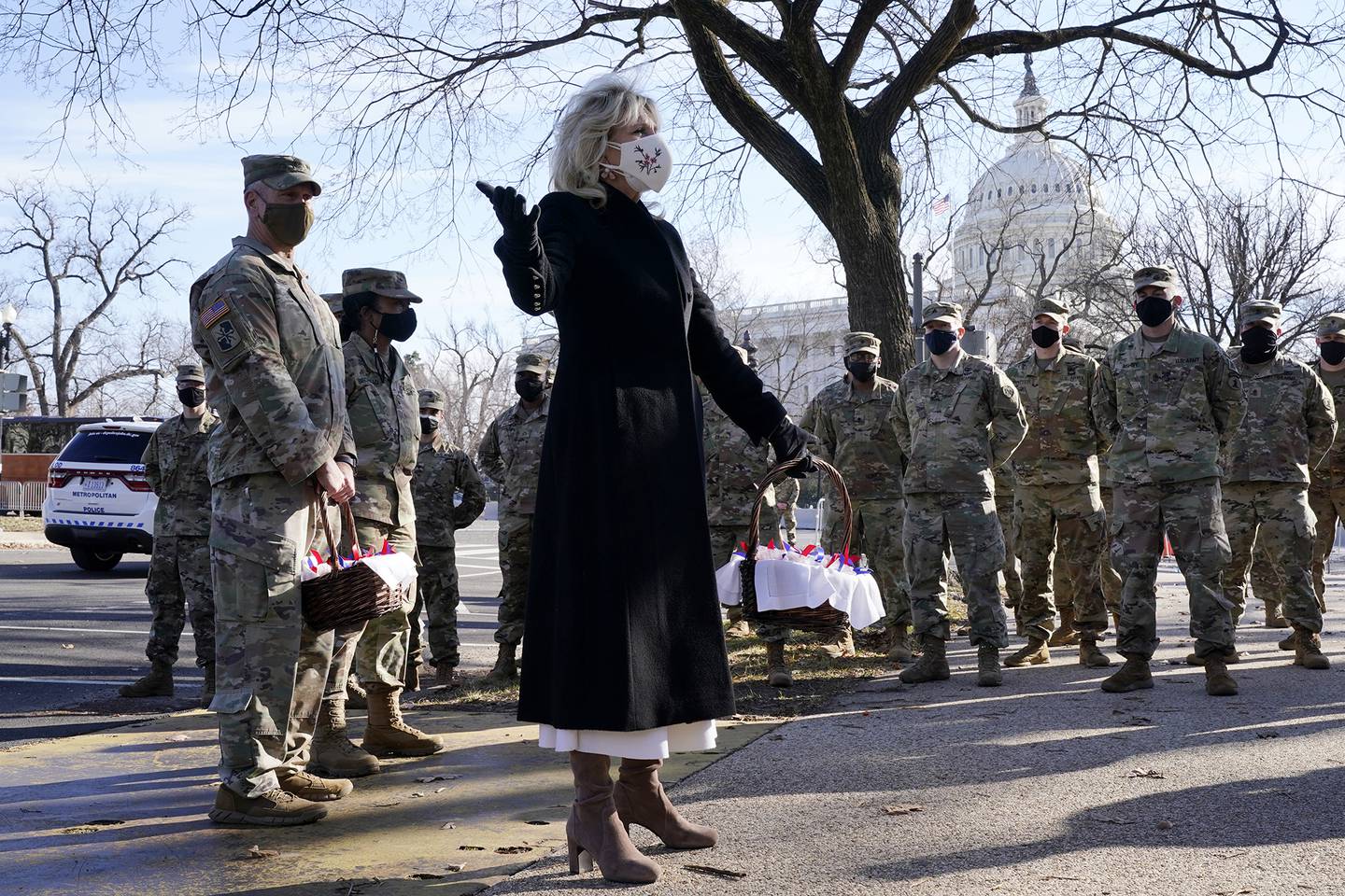 First lady Jill Biden surprises National Guard members outside the Capitol with chocolate chip cookies Jan. 22, 2021, in Washington.