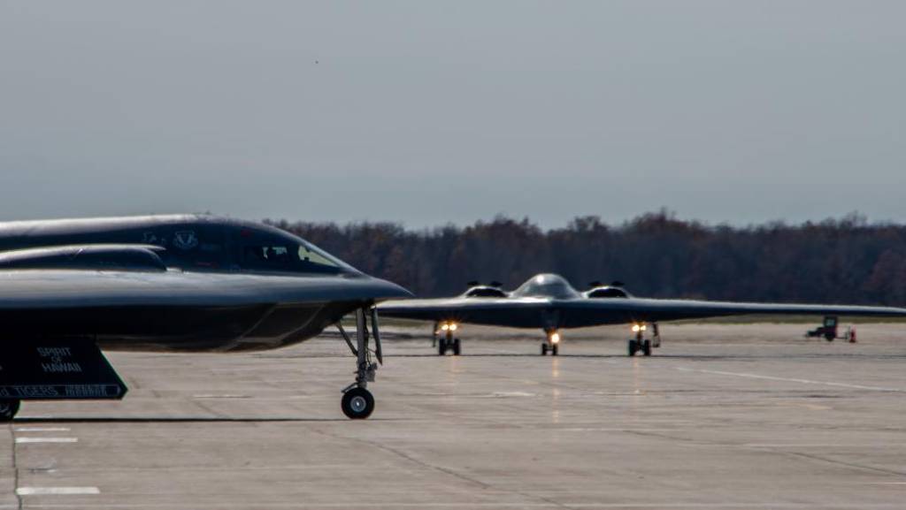 Two B-2 Spirit stealth bombers taxi to the runway during Exercise Spirit Vigilance 23 at Whiteman Air Force Base, Missouri, Nov. 7, 2022. (Airman 1st Class Phoenix Lietch/Air Force)