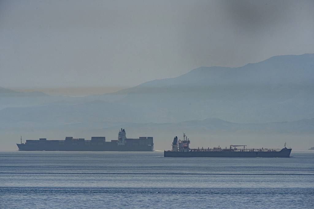 A view of the vessel the Clavel, right, sailing on international waters crossing the Gibraltar stretch on Wednesday, May 20, 2020.